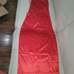 Silk form fitting date night dress.Backless/Straps